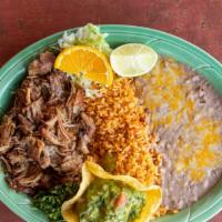Carnitas · Pieces of marinated pork served with guacamole.