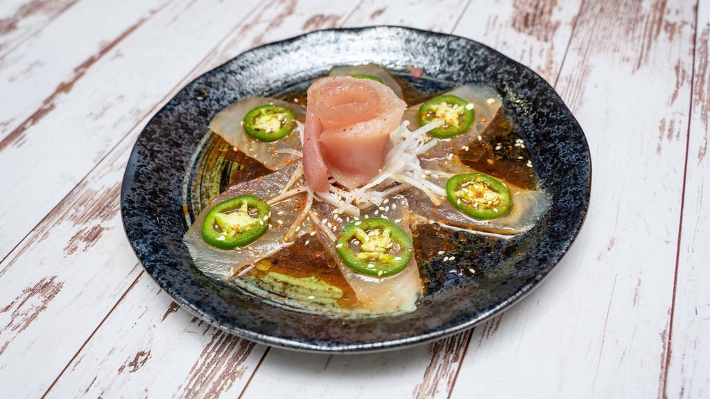Pepperfin · Thinly sliced albacore with jalapeño and spicy garlic ponzu.