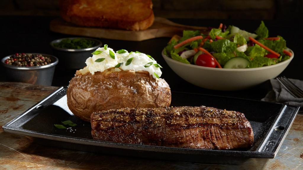 10 Oz. Signature Sizzler · Tender and juicy sirloin served with your choice of any 1 side. 690 cal.