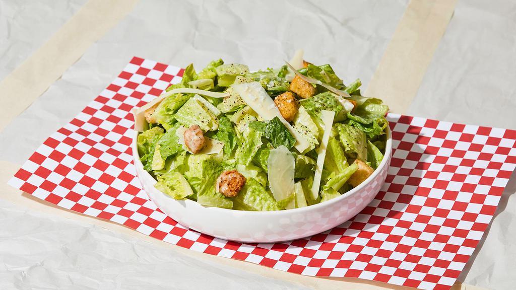 Caesar Salad · House caesar salad with romaine lettuce, parmesan, croutons and caesar dressing.