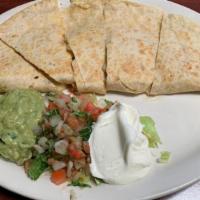 Quesadilla · Oversized warm flour tortilla and melted Monterey Jack cheese. Served with sour cream, guaca...