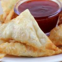 Crab Cheese Wonton (6 Pieces) · Crab meat and cream cheese inside.