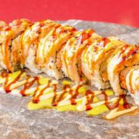 Ricky Bobby Roll · In: spicy crab, cream cheese, and tempura shrimp. 
Out: Seared  albacore.
