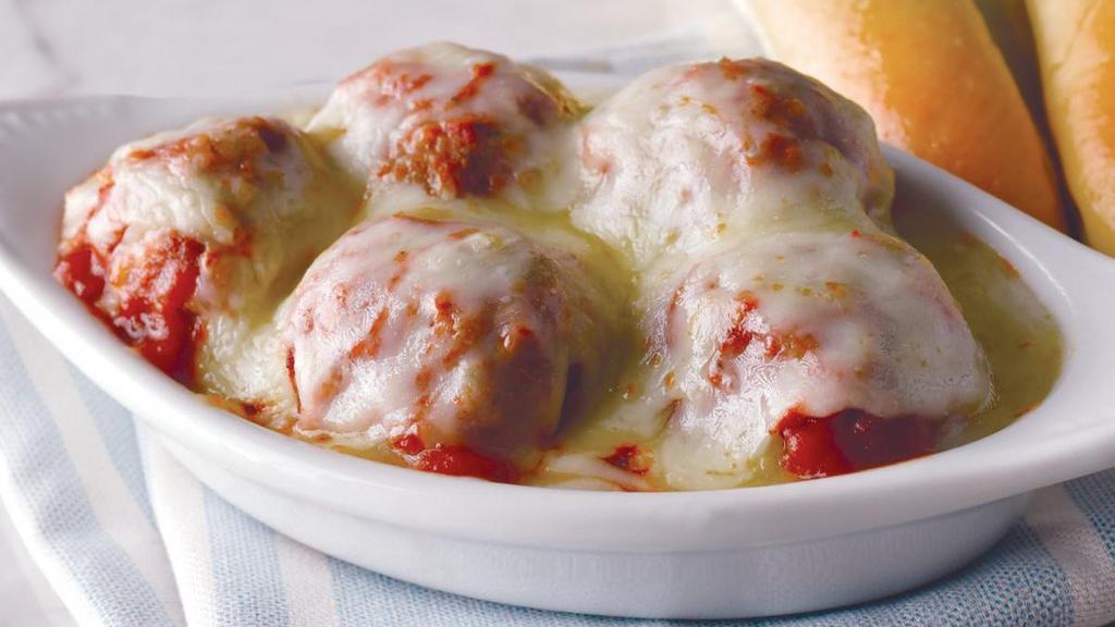 Baked Italian Meatballs · 5 meatballs topped with marinara sauce & baked with mozzarella & provolone cheeses.