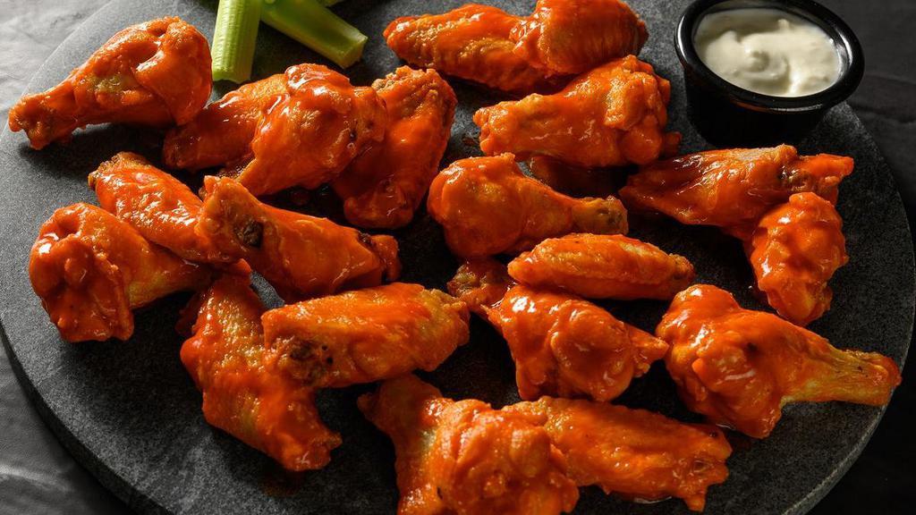20 Traditional Bone-In Wings · 20 Bone-in chicken wings deep fried with our Fazoli's seasoning blend and tossed with your choice of our signature flavors.. Wing orders include a side of celery and choice of ranch or bleu cheese..