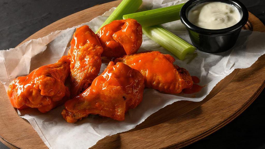 5 Traditional Bone-In Wings · 5 Bone-in chicken wings deep fried with our Fazoli's seasoning blend and tossed with your choice of our signature flavors.. Wing orders include a side of celery and choice of ranch or bleu cheese.