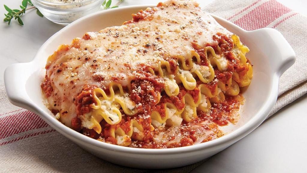 Baked Lasagna · Lasagna layered with Meat Sauce and Mozzarella and Provolone Cheeses.. Includes 2 of our Signature Garlic Breadsticks. If you're looking to add an additional side or toppings, please visit the Sides/Extras section of the menu.