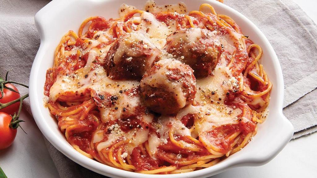 Baked Spaghetti With Meatballs · Spaghetti with Marinara Sauce loaded with Mozzarella Cheese and baked to a golden, bubbly perfection topped with Meatballs.. Includes 2 of our Signature Garlic Breadsticks. If you're looking to add an additional side or toppings, please visit the Sides/Extras section of the menu.