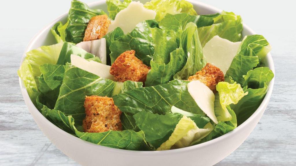 Caesar Side Salad · Romaine topped with shaved Parmesan and crunchy Focaccia croutons. Served with our Signature Caesar dressing.