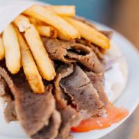 Beef/Lamb Gyro · A seasoned beef and lamb mix, cooked on a vertical rotisserie, served on a warm pita bread f...