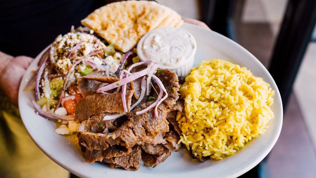 Gyro Plate · Your choice from any of our three incredibly tasty gyro meats beef and lamb, pork, or chicken, served with rice pilaf or french fries, Greek salad, tzatziki sauce or Greek yogurt and pita bread.