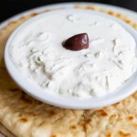 Tzatziki · The infamous Greek yogurt, cucumber, and garlic dip.