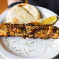 Chicken Souvlaki On A Stick · Seasoned chicken cubed and skewered on a stick, cooked over open flame and served with a min...