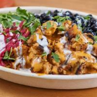 Peri Peri Chicken Bowl · turmeric brown rice, grilled marinated chicken, peri peri sauce, avocado, black beans, purpl...