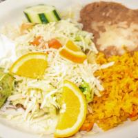 Taquitos Verdes · 3 taquitos served with rice, beans, sour ceam & guacamole