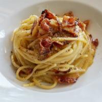 Spaghetti Carbonara · guanciale Italian bacon, egg, pecorino, black pepper