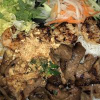 When Tom Met Piggy Vermicelli Noodle Salad · Pork and shrimp skewer.