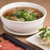 Filet Mignon Pho · Tender slices of steak that melts in your mouth