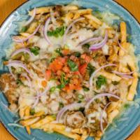 Chile Verde Fries · Seasoned fries topped with our house Verde sauce, onions and jack cheese.