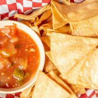 Chips & Salsa · Crispy chips and a side of mild authentic Mexican Salsa.