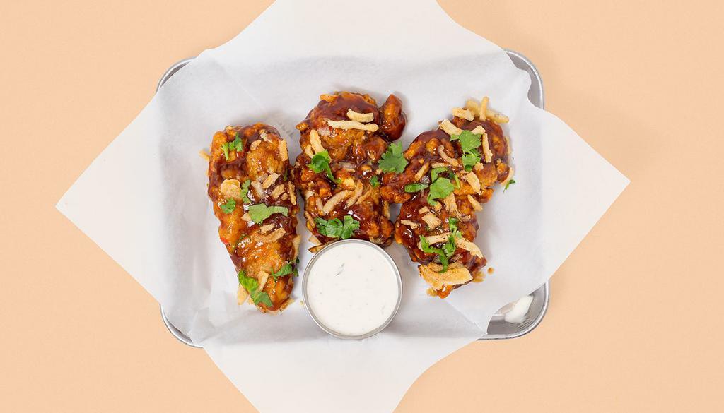 Honey Bbq Tenders · Three crispy fried chicken tenders slathered in Honey BBQ with scallions, fried onion strings, and your choice of dipping sauce