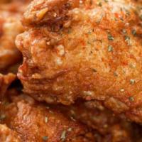 Nashville Hot Tenders · Three crispy fried chicken tenders seasoned with our nashville hot spice blend and topped wi...
