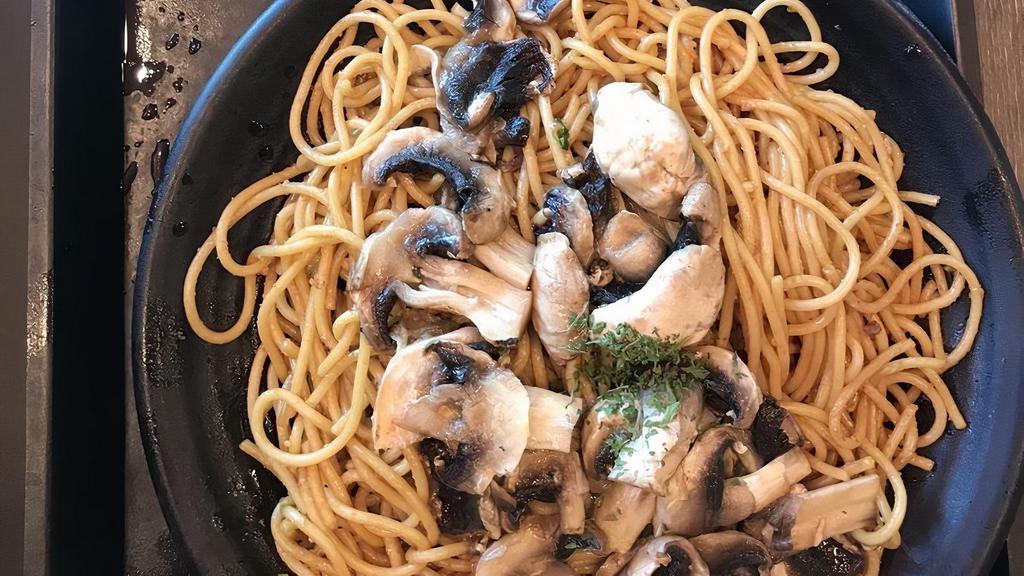 Mushroom Garlic Noodles · Served with soup and salad.