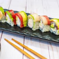Rainbow Roll · 8 Pieces.

Inside: Imitation Crab + Avocado
Top: Sliced Albacore,  Sliced Tuna ,  Sliced Yel...