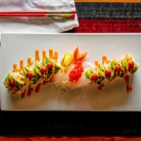 Mexican Roll · Spicy crab meat shrimp inside and avocado outside.