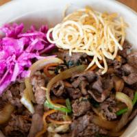 Bulgogi (Beef) · Sautéed 24 hours marinated beef with shiitake mushrooms, sliced onions, carrot, and cabbages...