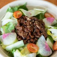 Bulgogi Salad · Fresh salad with bulgogi beef, lettuce, spring mix, cherry tomato and cucumber served with p...