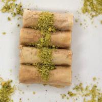 Fingers Baklava · Thin layers of fillo rolled and filled with imported premium cashews. It is the most popular...