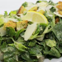 Caesar Salad · Leafy romaine, House Made croutons, and shaved parmesan tossed in our House Made creamy caes...