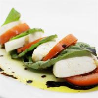 Caprese Salad · Fresh mozzarella, Roma tomatoes, basil, olive oil and balsamic vinegar. . Add Chicken Breast...