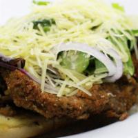 Marciano - Steak Milanesa Sandwich · Our Famous Milanesa lightly fried, with red onions and lightly dressed spring mix in our hou...