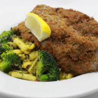 Cavatelli Pasta With Broccoli And Milanesa · Cavatelli pasta served with broccoli and milanesa, prepared in an olive oil and garlic sauce.