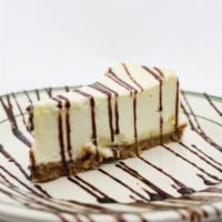 Cheesecake · New York styled cheesecake, served with a seasonal puree.