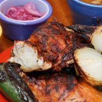 Whole Chicken Combo 1 · Includes salsa, onions and tortillas. Comes with Rice and beans