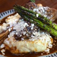 Lamb Shank · Braised in a red wine, fresh tomato sauce with hints of cinnamon and black pepper. Served wi...