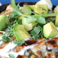 Chicken Verde · pulled chicken, salsa verde, poblano chiles, cheese, crema & avocado. Served with 2 sides