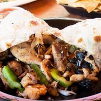 North Park Burrito · Rice, black beans, mushrooms, bell peppers, grilled onions, Jack cheese, and grilled chicken.