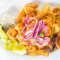 Jalea De Mariscos (Seafood) · Deep fried fish mixed with shrimps, calamari, mussels, clams and yucca or fries, served with...