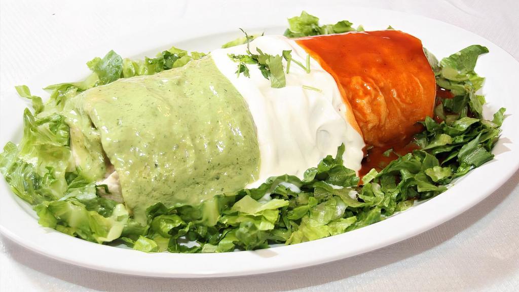 Jimmy'S Burrito · Flour tortilla, choice of meat, rice, beans, onions, cilantro, salsa, topped with sour cream guacamole and enchilada sauce, garnished with cheese.