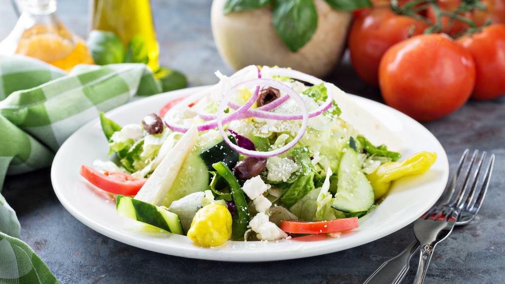 House Salad · Fresh romaine and power green mix topped with grape tomatoes, red onion, cucumbers, and carrots. Served with red wine vinaigrette or ranch dressing.
