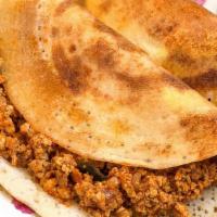 Mutton Mastan Dosa · Crepe stuffed with goat curry