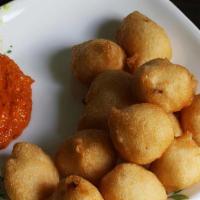 Punugulu · lentil batter cooked with onions and chilli and deep fried