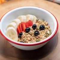 Pumpkin Seed Granola · low fat yoghurt, strawberries, banana, toasted almonds