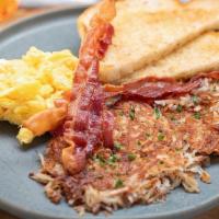 Classic Breakfast Plate · 2 eggs, hash browns, bacon or sausage, toast