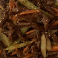 Crispy Shredded Beef · Hot and spicy. Shredded beef, deep fried to crispy, with celery and carrots. Served with swe...