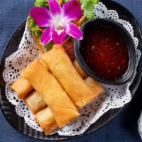 Egg Rolls · Fried vegetarian rolls of cabbage, celery, carrot, glass noodle served with sweet & sour sau...